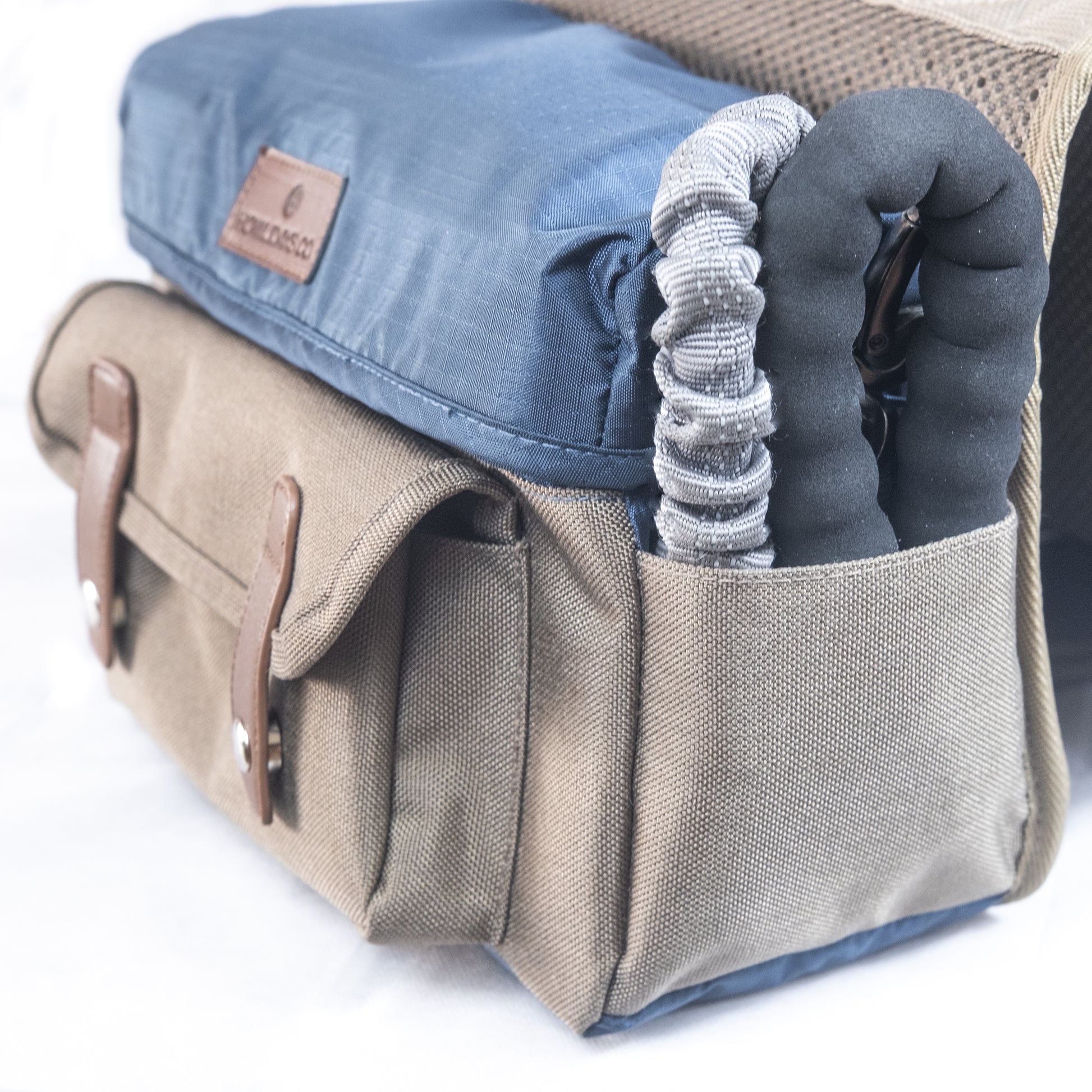 Dog backpack design featuring convenient side pocket for leash and accessories