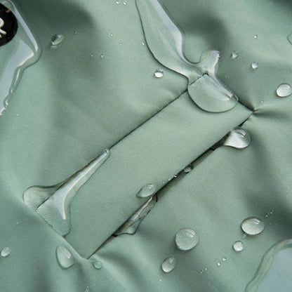 Dog raincoat with water droplets on the fabric, demonstrating its waterproof and protective design for outdoor adventures.