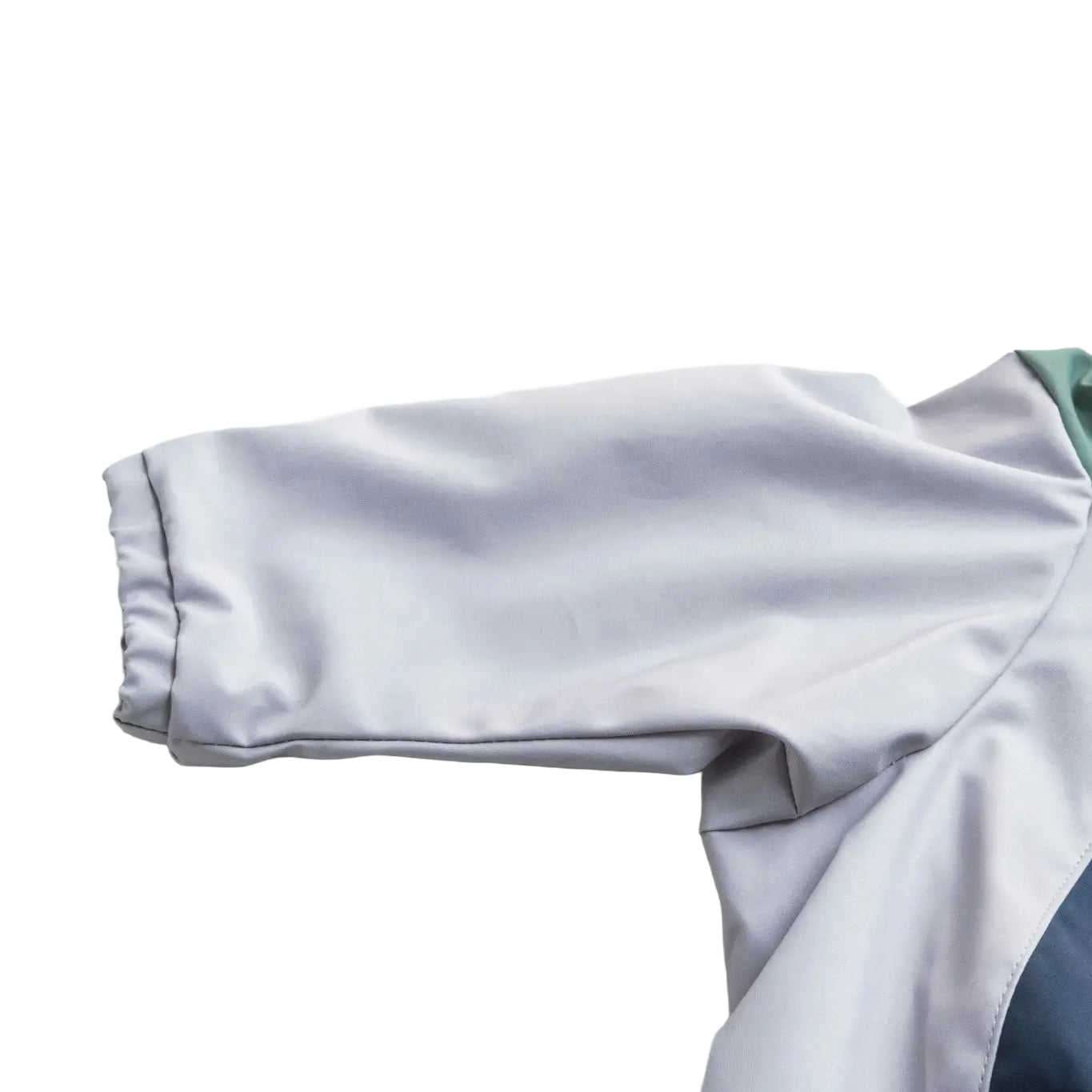 Close-up of dog raincoat sleeve, showing design, fit, and protection for outdoor adventures.